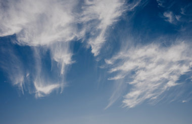 Wispy clouds in a blue sky