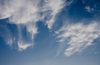 Wispy clouds in a blue sky