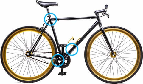 black and yellow men’s bicycle with blue rings indicating where to find the frame number on the bike.